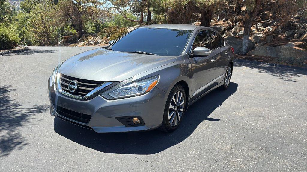 used 2016 Nissan Altima car, priced at $9,750