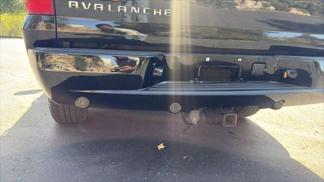 used 2009 Chevrolet Avalanche car, priced at $13,495