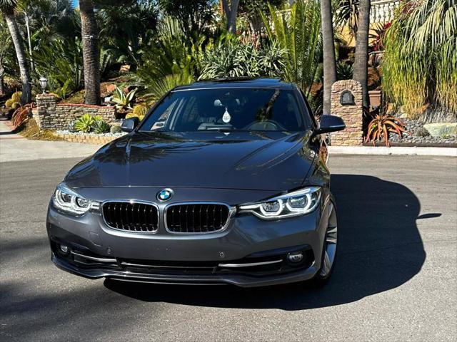 used 2018 BMW 330 car, priced at $18,495