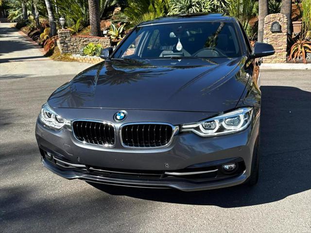 used 2018 BMW 330 car, priced at $18,495