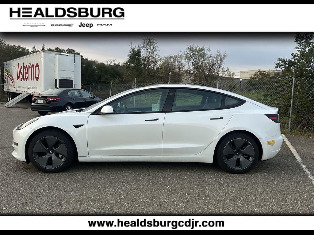 used 2022 Tesla Model 3 car, priced at $28,890