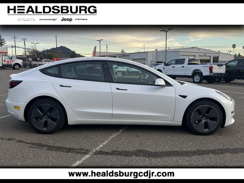 used 2022 Tesla Model 3 car, priced at $28,890