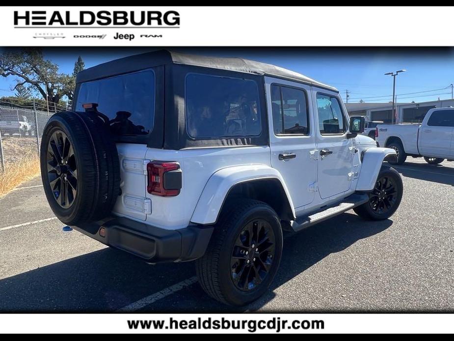 used 2023 Jeep Wrangler 4xe car, priced at $39,856