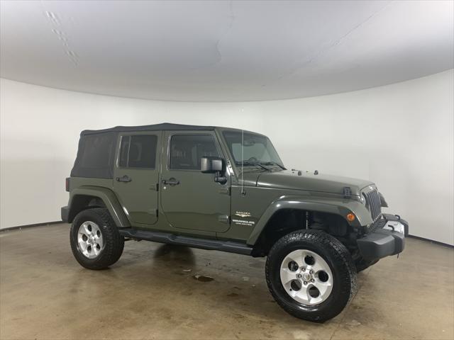 used 2015 Jeep Wrangler Unlimited car, priced at $16,666