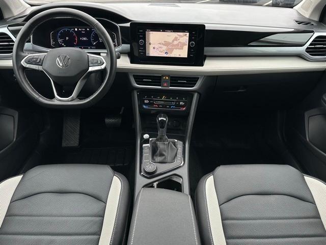 used 2025 Volkswagen Taos car, priced at $30,891
