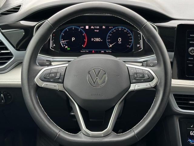used 2025 Volkswagen Taos car, priced at $30,891