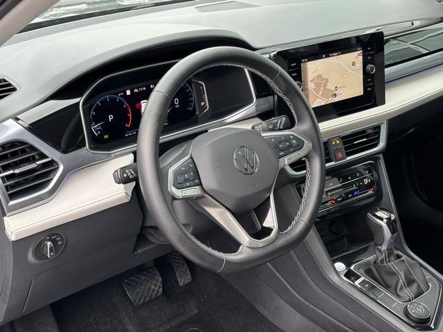used 2025 Volkswagen Taos car, priced at $30,891