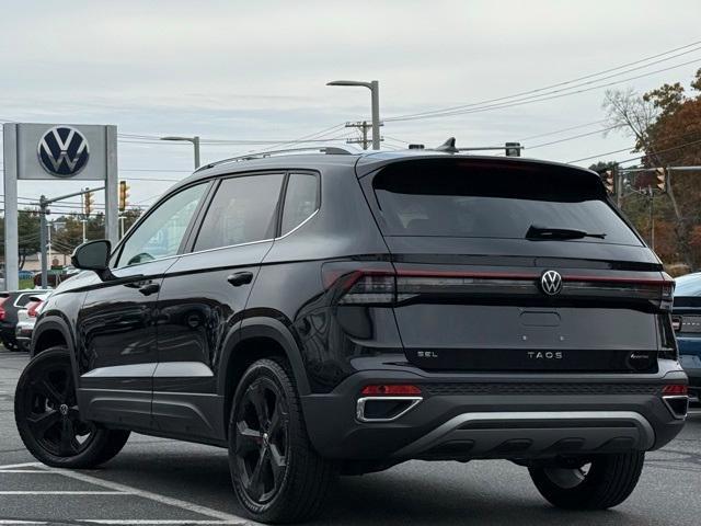 used 2025 Volkswagen Taos car, priced at $30,891