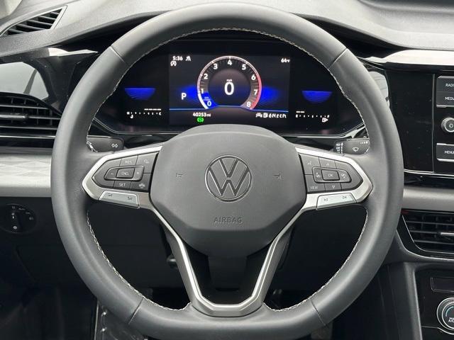 used 2023 Volkswagen Taos car, priced at $21,192