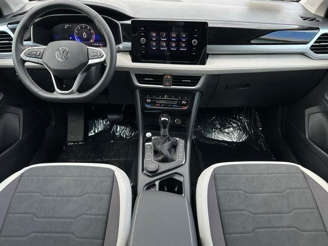 used 2025 Volkswagen Taos car, priced at $27,692