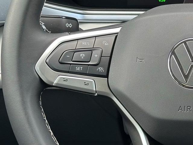 used 2025 Volkswagen Taos car, priced at $27,692