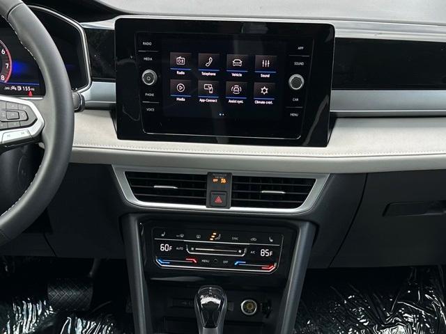 used 2025 Volkswagen Taos car, priced at $27,692