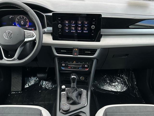 used 2025 Volkswagen Taos car, priced at $27,692