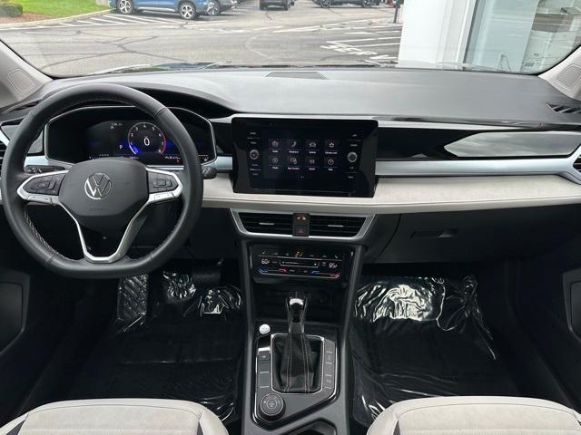 used 2025 Volkswagen Taos car, priced at $27,983