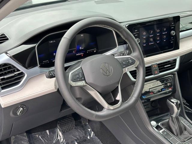 used 2025 Volkswagen Taos car, priced at $27,983