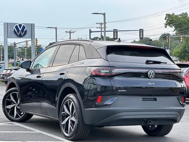 used 2023 Volkswagen ID.4 car, priced at $26,590