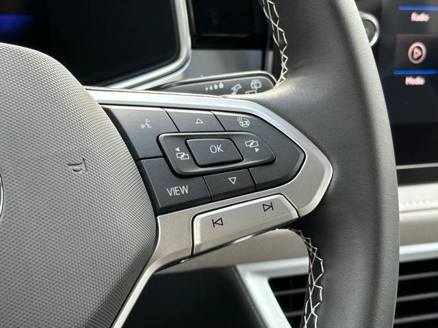 used 2025 Volkswagen Taos car, priced at $26,982