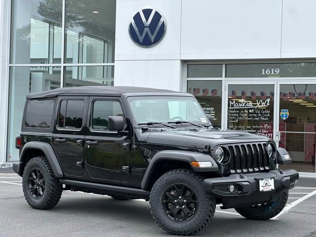 used 2023 Jeep Wrangler car, priced at $30,492