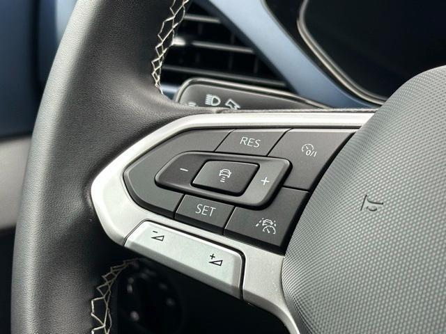 used 2023 Volkswagen Taos car, priced at $22,693