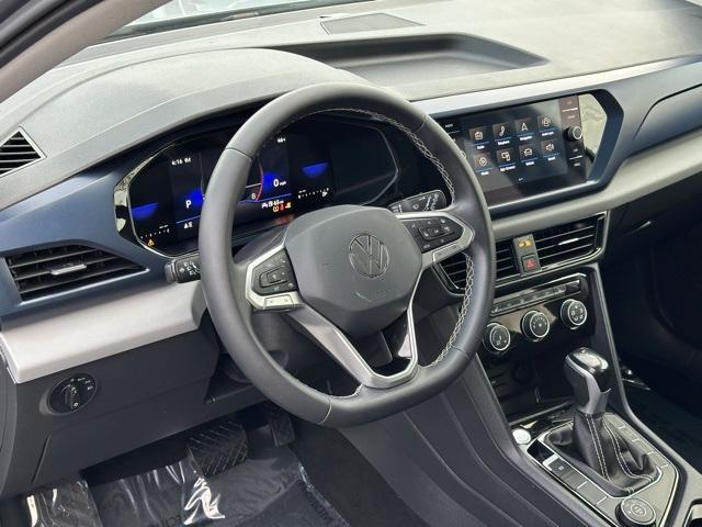 used 2023 Volkswagen Taos car, priced at $22,491