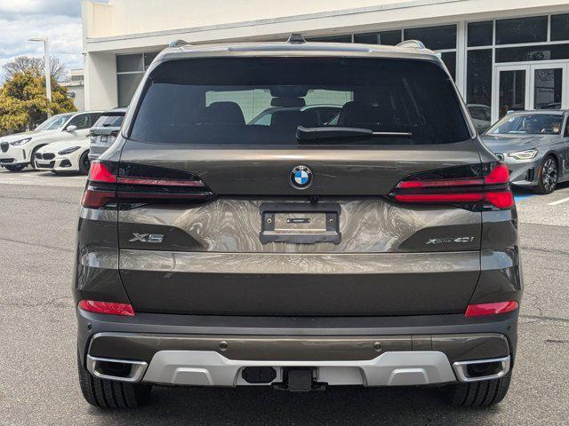 used 2025 BMW X5 car, priced at $69,990