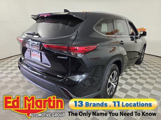 used 2022 Toyota Highlander Hybrid car, priced at $30,285