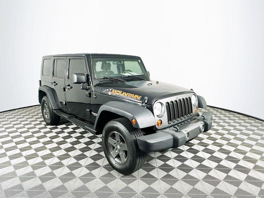 used 2010 Jeep Wrangler Unlimited car, priced at $12,500