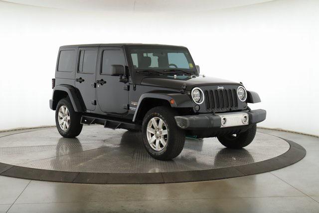 used 2012 Jeep Wrangler Unlimited car, priced at $14,895