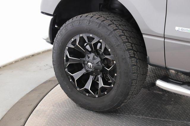 used 2014 Ford F-150 car, priced at $14,000
