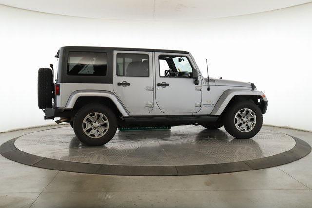used 2013 Jeep Wrangler Unlimited car, priced at $13,977