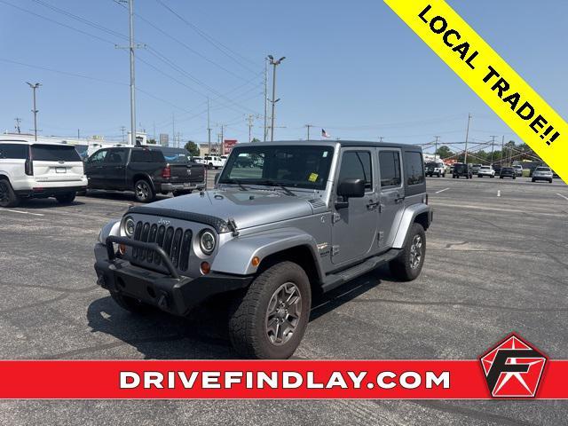 used 2013 Jeep Wrangler Unlimited car, priced at $13,977