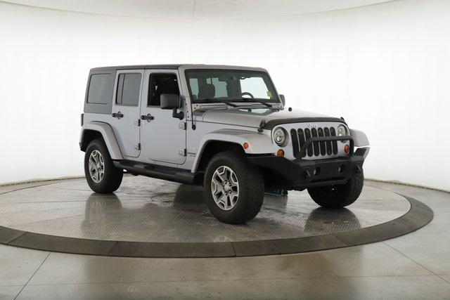 used 2013 Jeep Wrangler Unlimited car, priced at $13,977