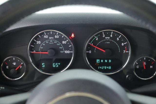 used 2013 Jeep Wrangler Unlimited car, priced at $13,977