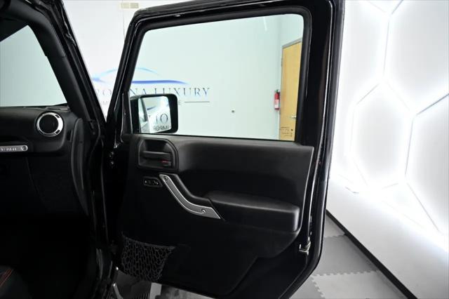 used 2016 Jeep Wrangler Unlimited car, priced at $34,588