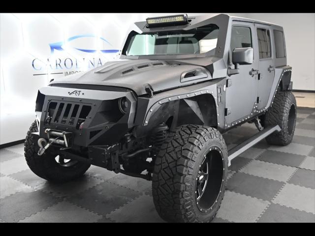 used 2016 Jeep Wrangler Unlimited car, priced at $34,588