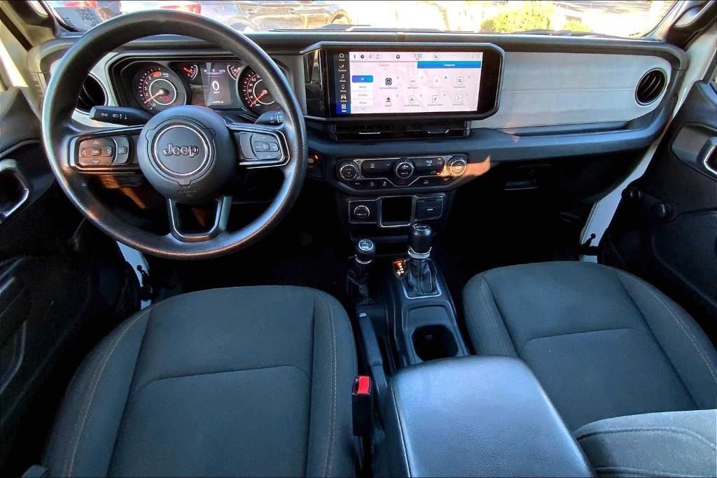 used 2024 Jeep Wrangler car, priced at $28,942