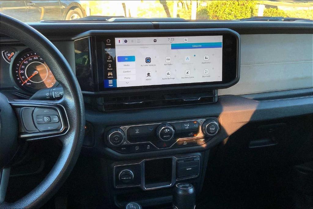 used 2024 Jeep Wrangler car, priced at $28,942