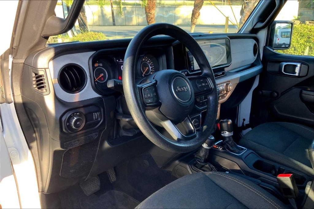 used 2024 Jeep Wrangler car, priced at $28,942
