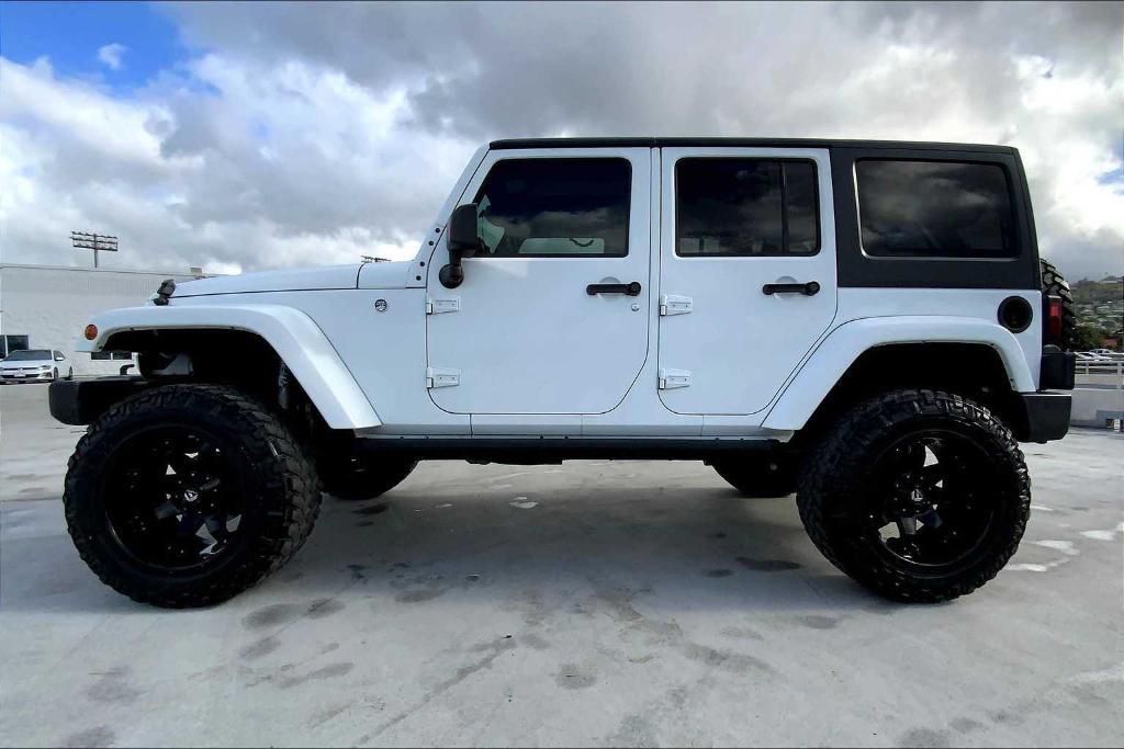 used 2016 Jeep Wrangler Unlimited car, priced at $25,185