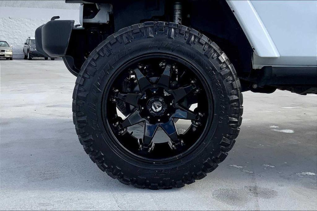 used 2016 Jeep Wrangler Unlimited car, priced at $25,185