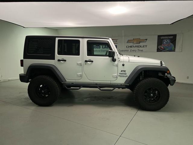 used 2017 Jeep Wrangler Unlimited car, priced at $23,492