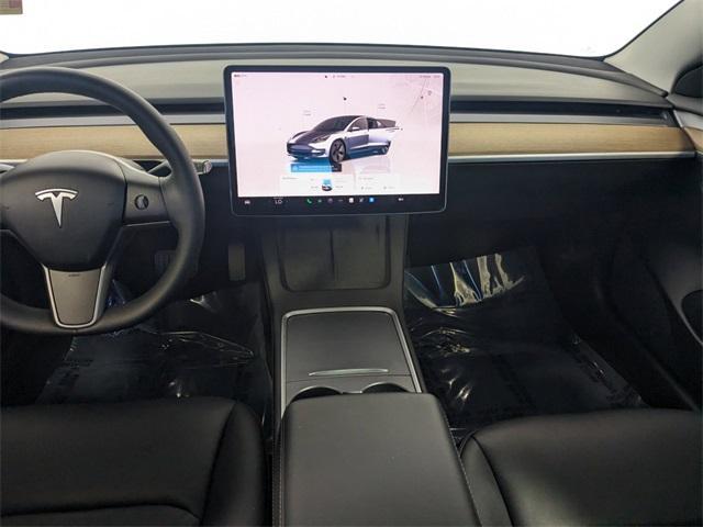 used 2022 Tesla Model 3 car, priced at $27,900