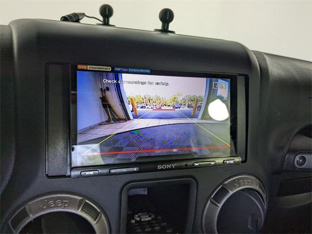 used 2016 Jeep Wrangler Unlimited car, priced at $23,700