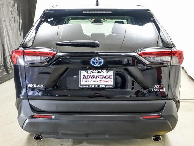 used 2021 Toyota RAV4 Hybrid car, priced at $29,973