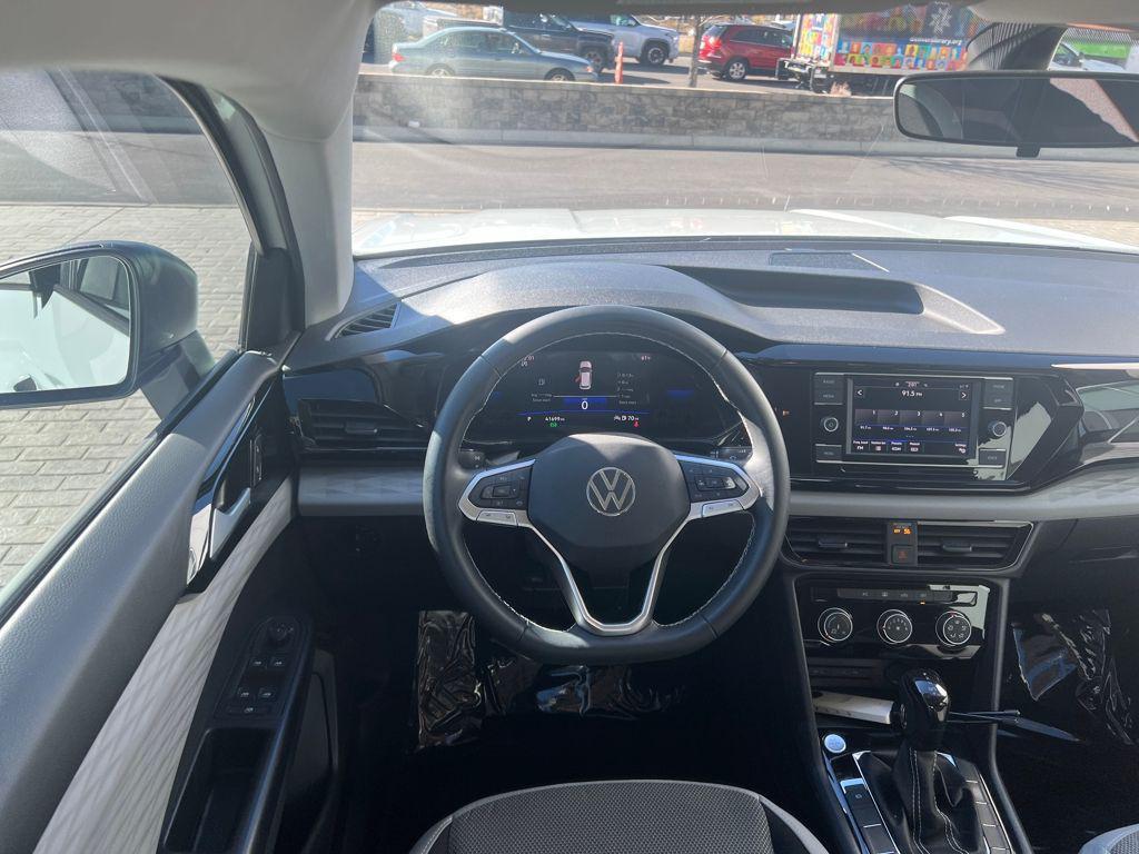 used 2023 Volkswagen Taos car, priced at $18,090