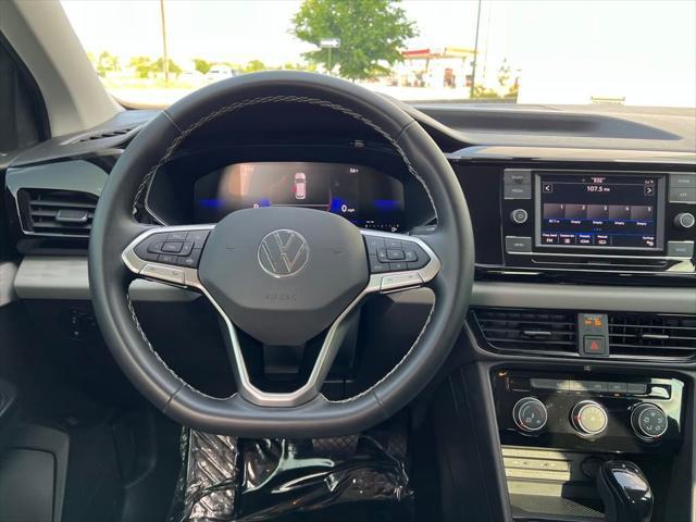 used 2023 Volkswagen Taos car, priced at $21,878