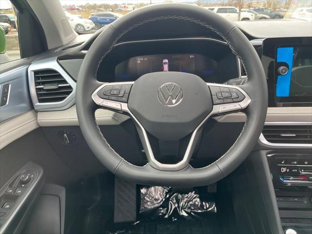 new 2025 Volkswagen Taos car, priced at $30,611