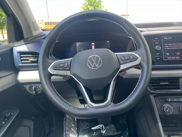 used 2022 Volkswagen Taos car, priced at $24,299