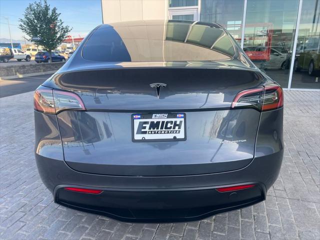used 2023 Tesla Model Y car, priced at $30,000