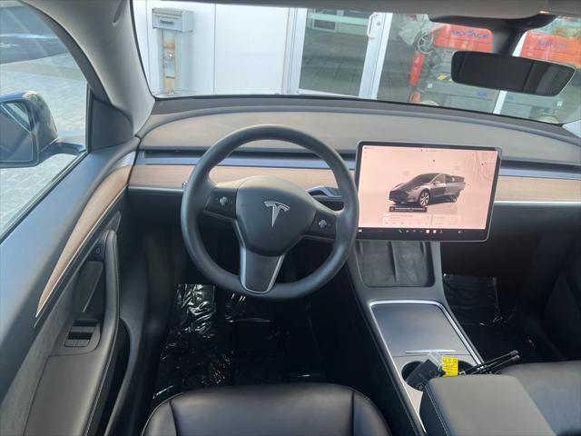 used 2023 Tesla Model Y car, priced at $30,000
